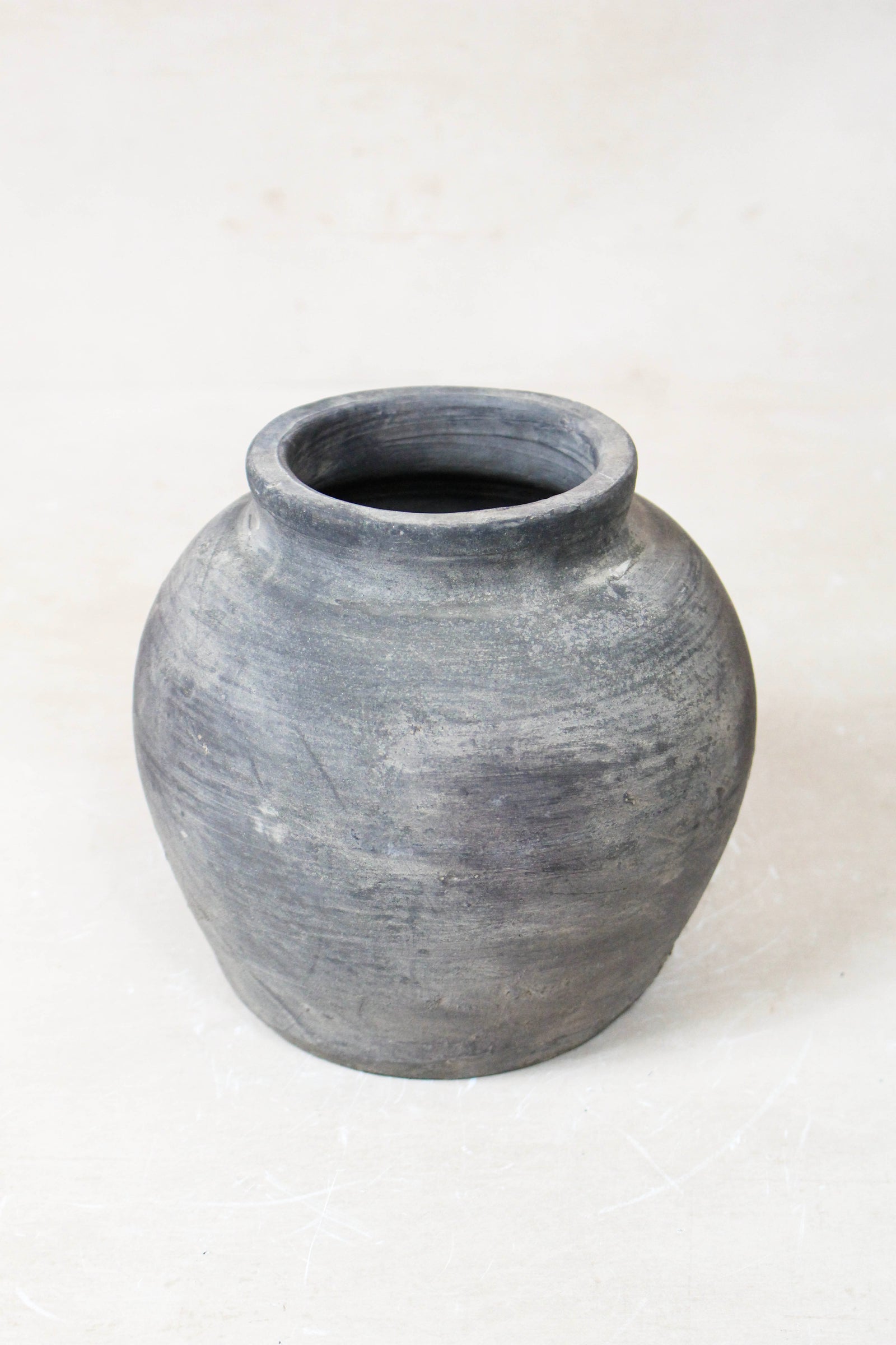 Small vintage dark unglazed earthenware pot from Shanxi, China