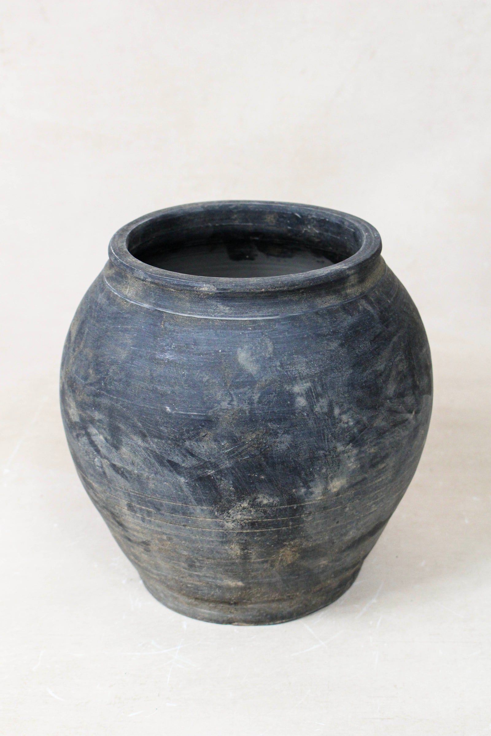 Small vintage dark unglazed earthenware pot from Shanxi, China