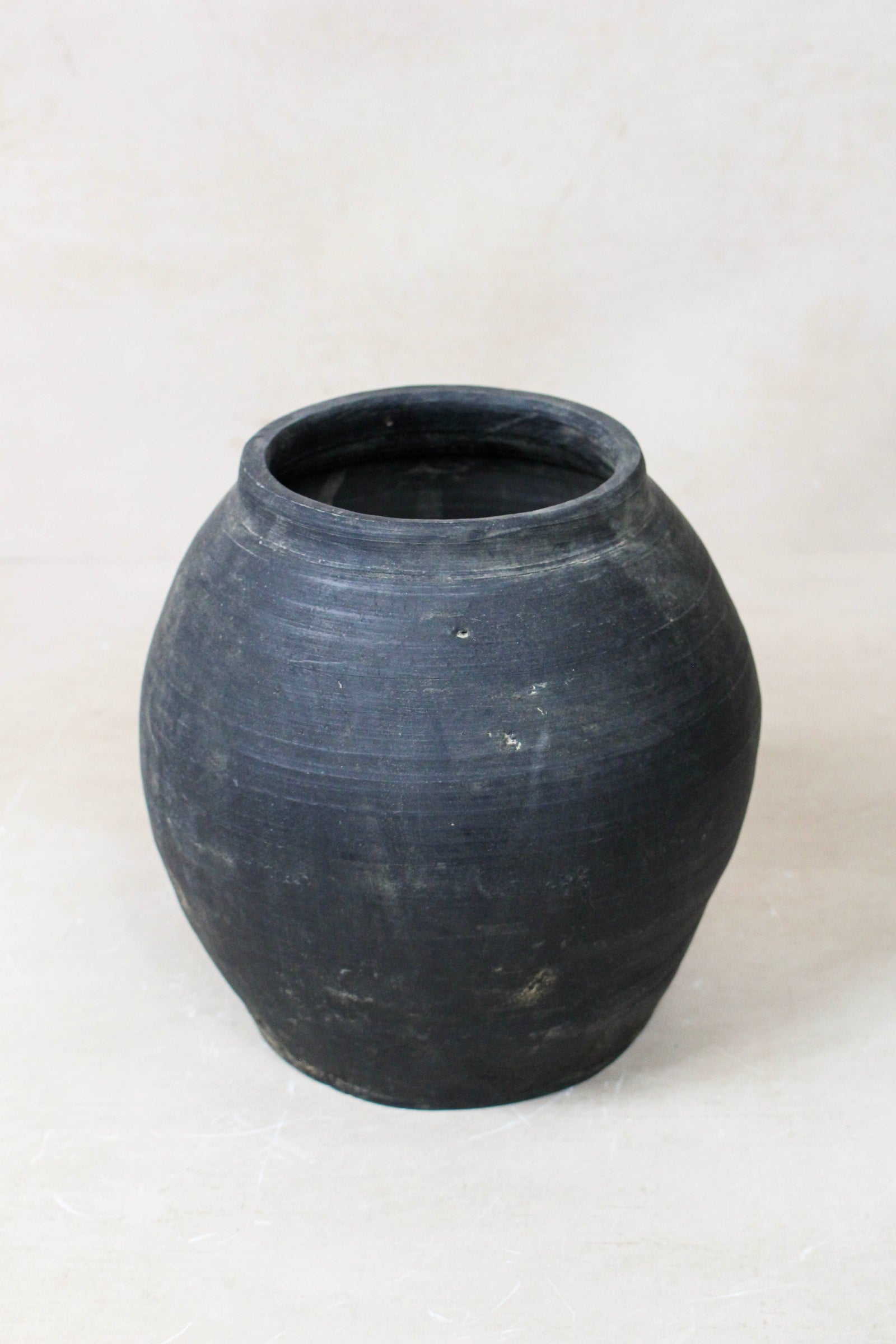 Small vintage dark unglazed earthenware pot from Shanxi, China