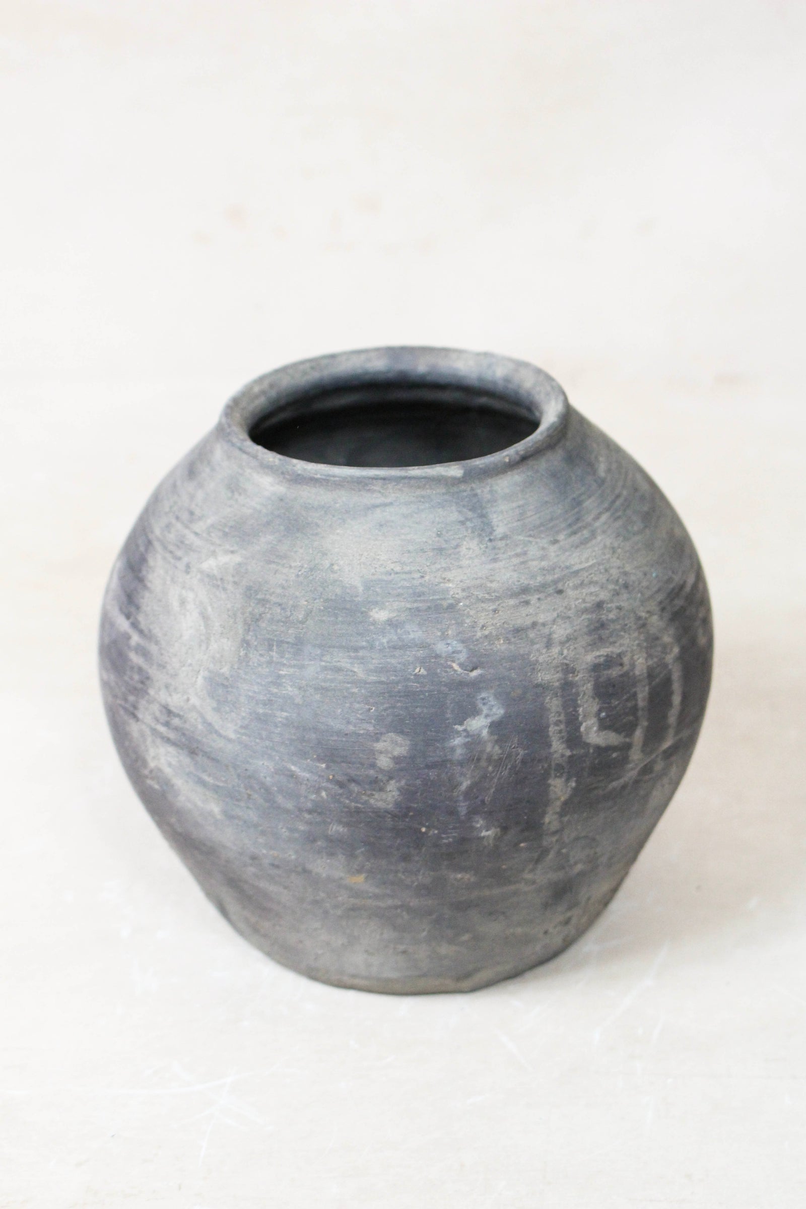 Small vintage dark unglazed earthenware pot from Shanxi, China