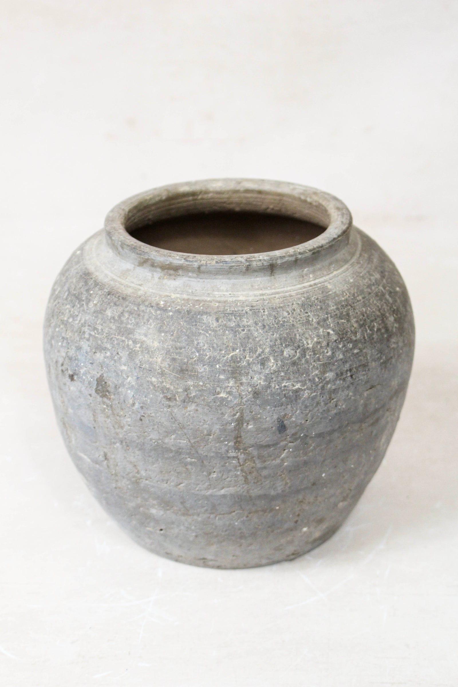 Small vintage dark unglazed earthenware pot from Shanxi, China
