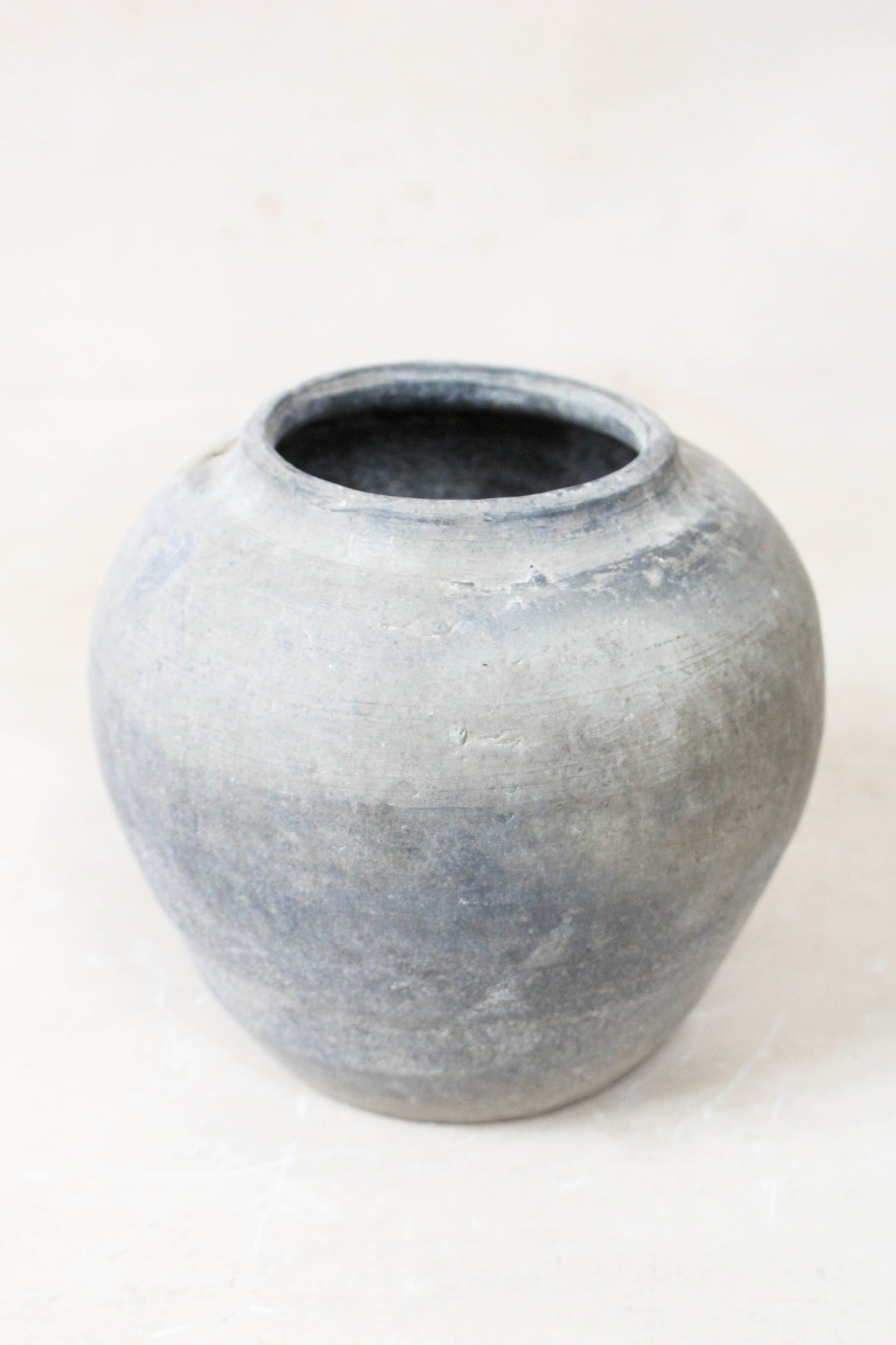 Small vintage dark unglazed earthenware pot from Shanxi, China