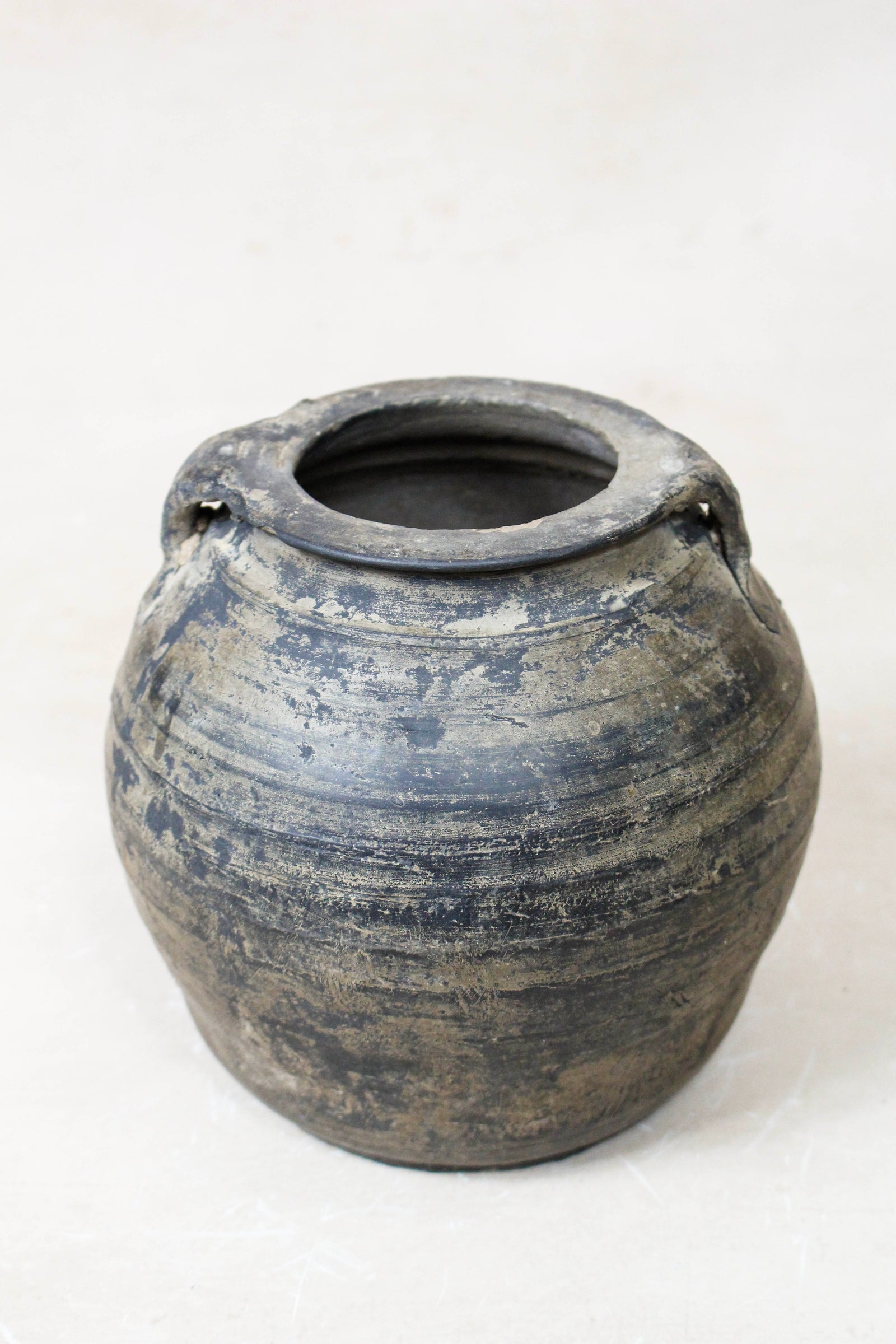 Small vintage dark unglazed earthenware pot from Shanxi, China