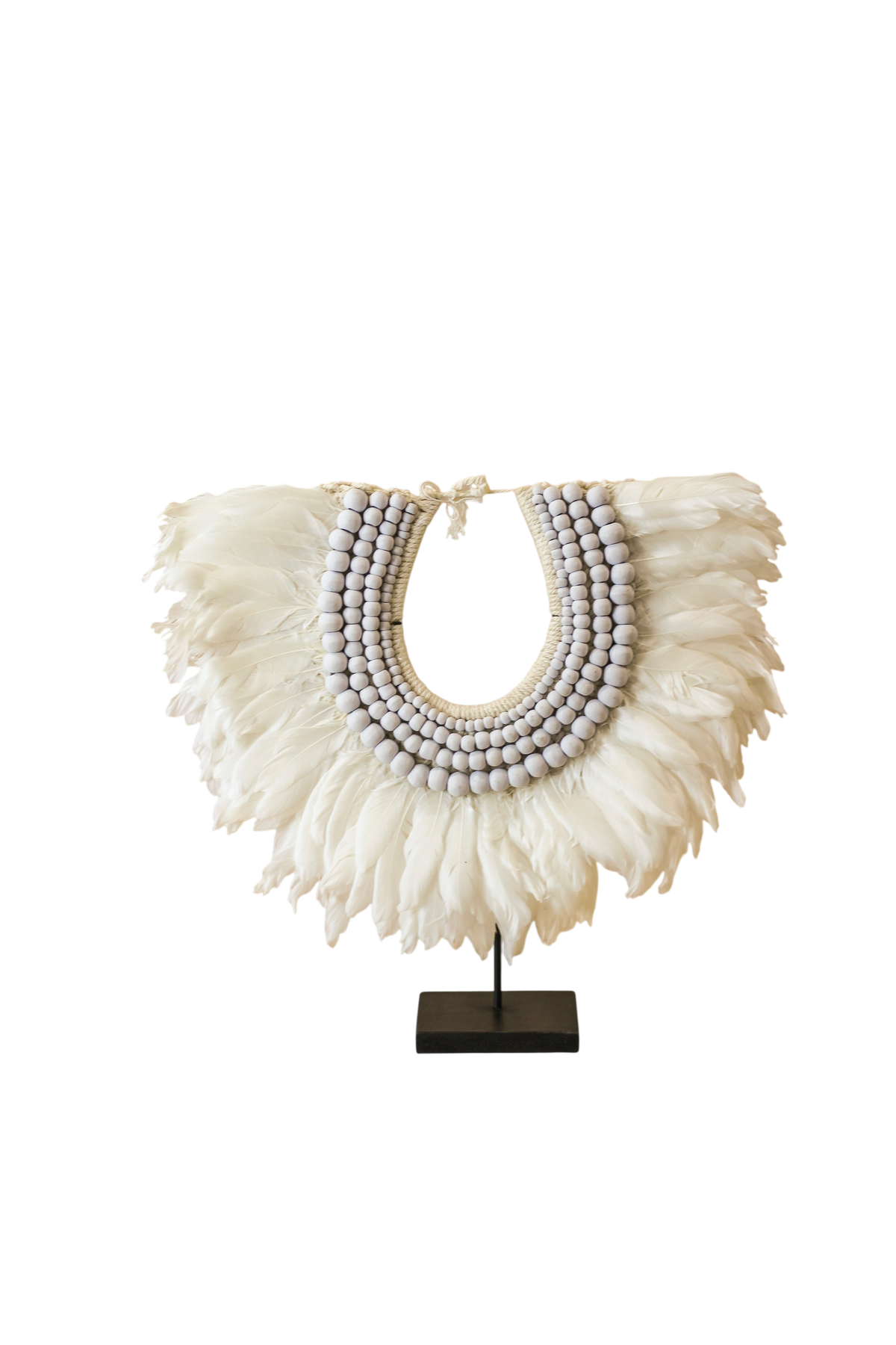 Handmade Indonesian feather and bead necklace on a display stand