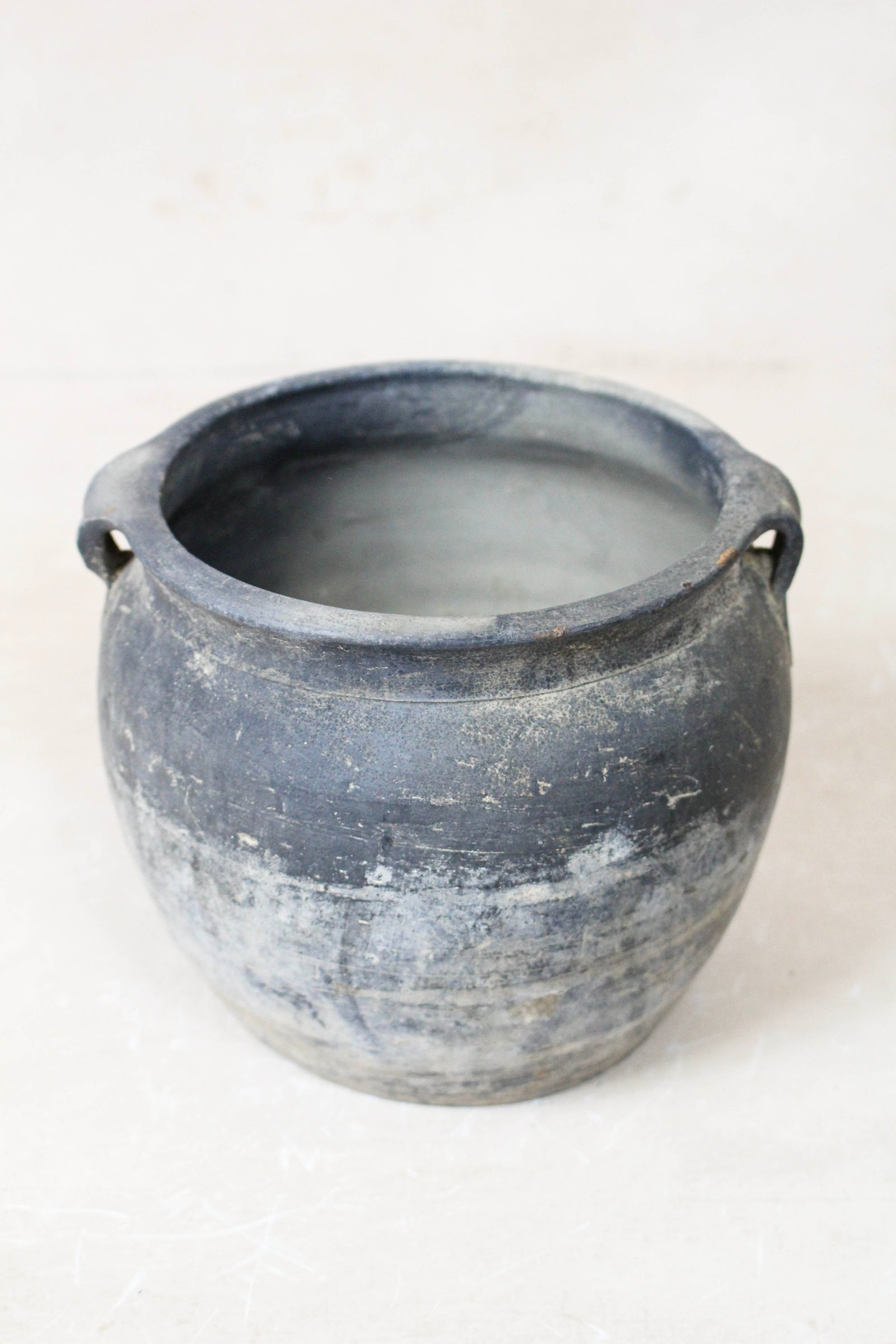 Small vintage dark unglazed earthenware pot from Shanxi, China
