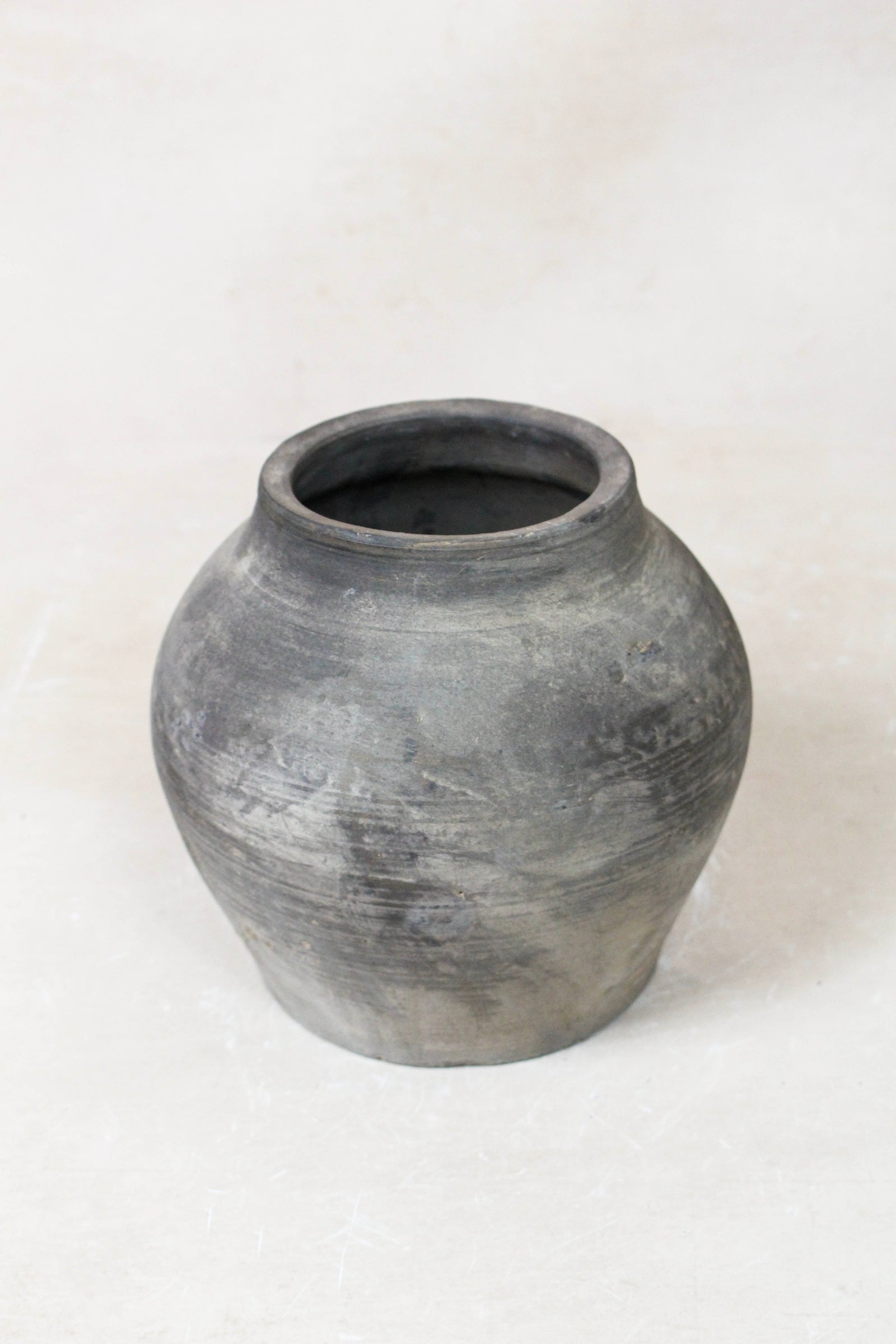 Small vintage dark unglazed earthenware pot from Shanxi, China