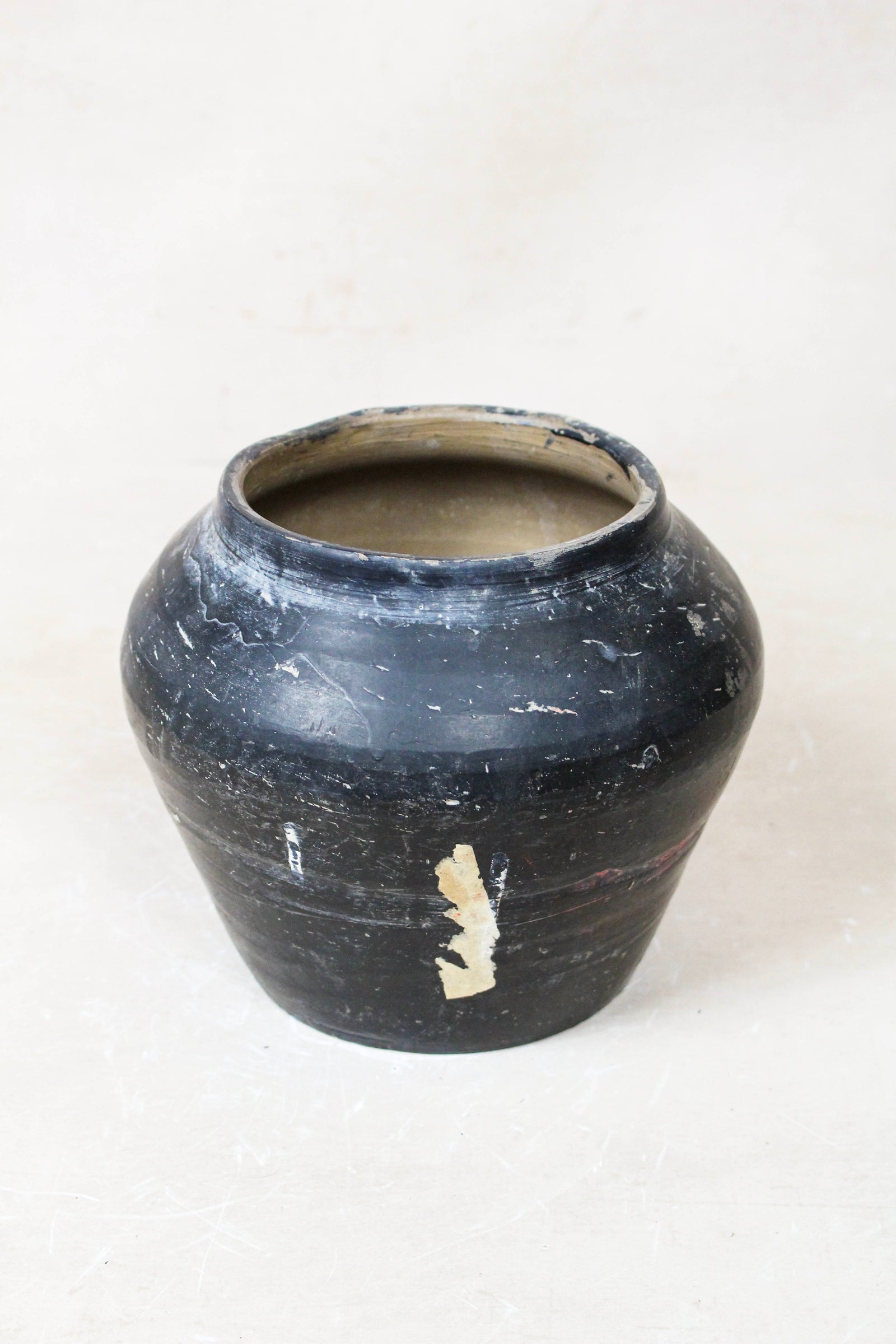 Small vintage dark unglazed earthenware pot from Shanxi, China