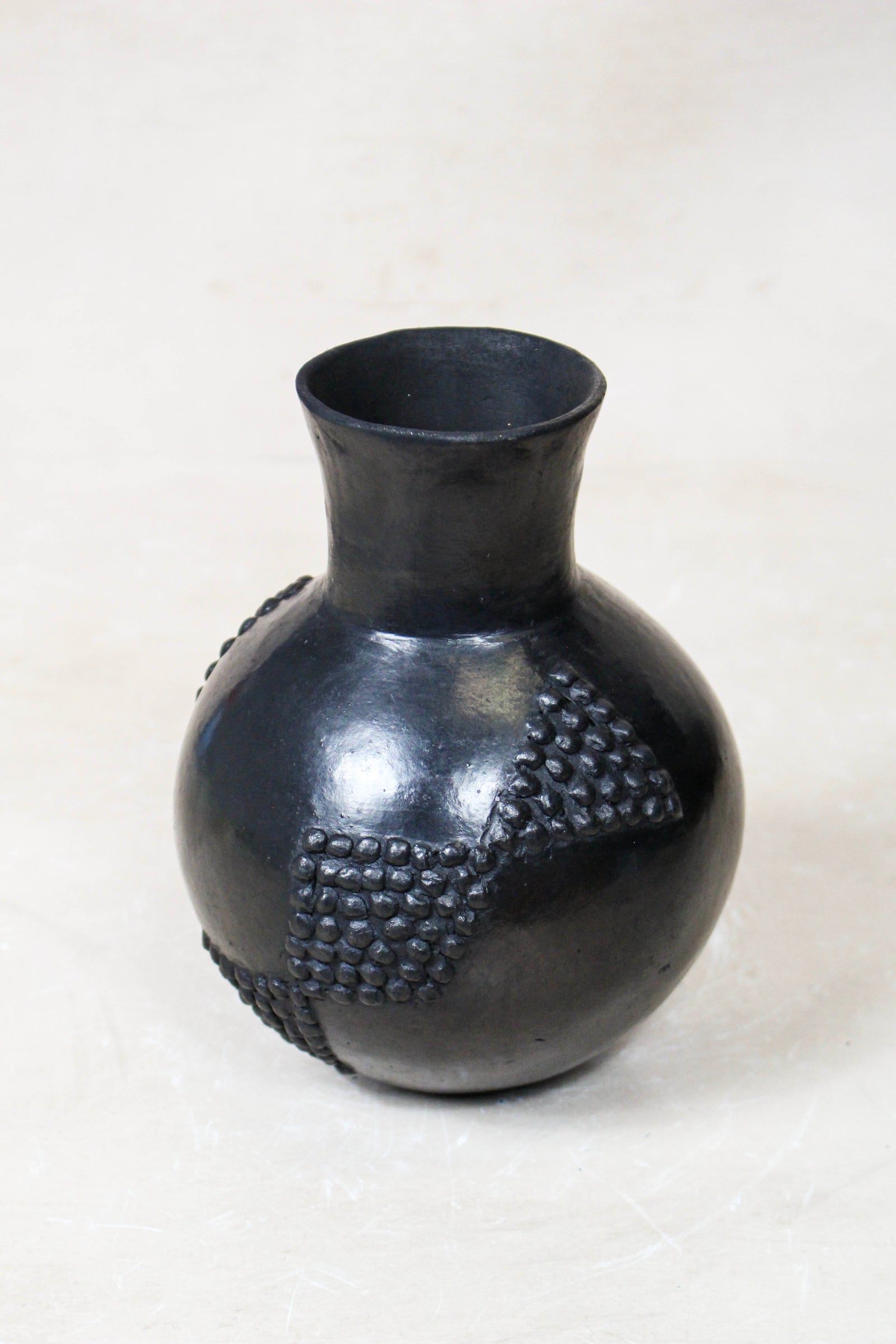 Small hand-built Zulu pot in pit-fired clay, South Africa (12.2)