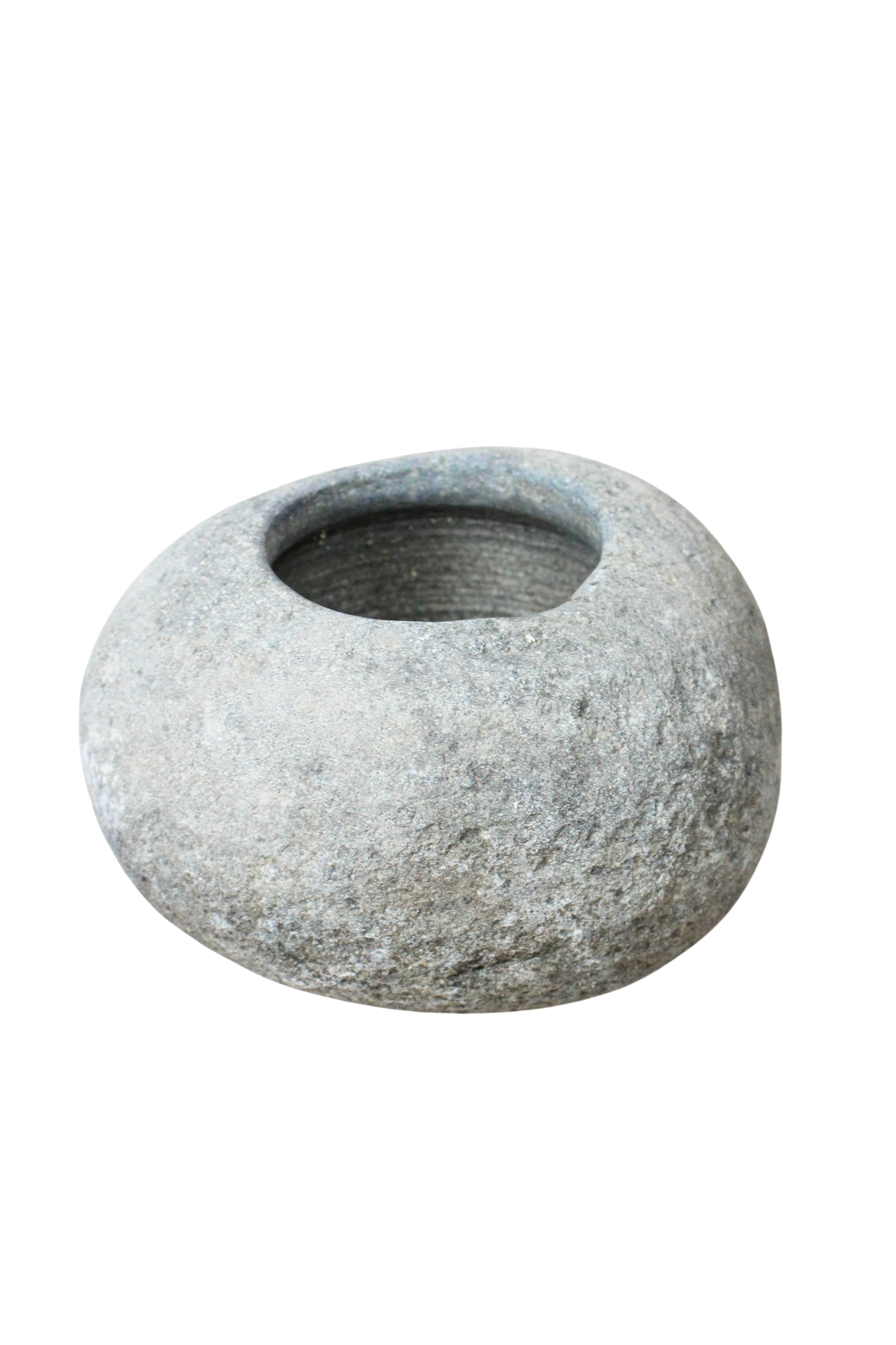 Planter hollowed by hand from a single smooth river stone, for direct planting