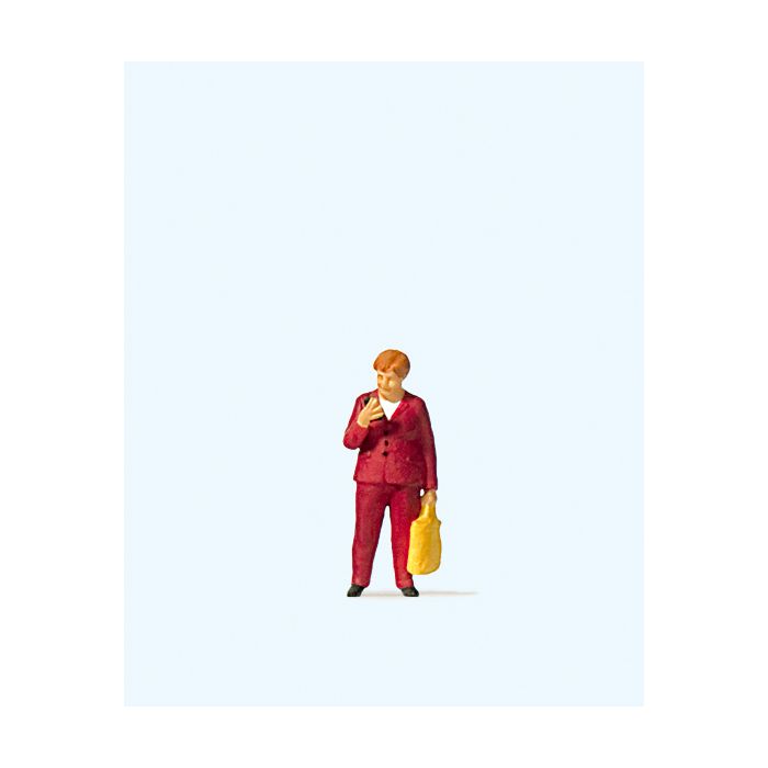 Hand-painted novelty Angela Merkel miniature terrarium figure, 1:87 scale