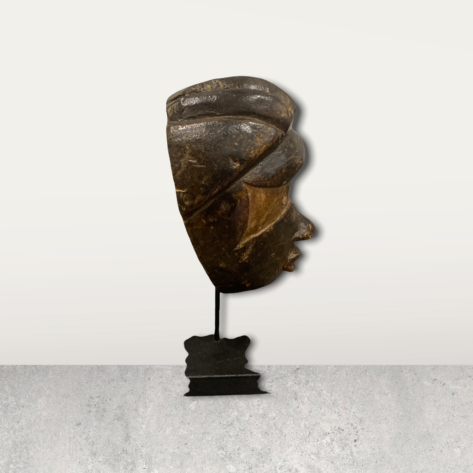 Small African mask on stands