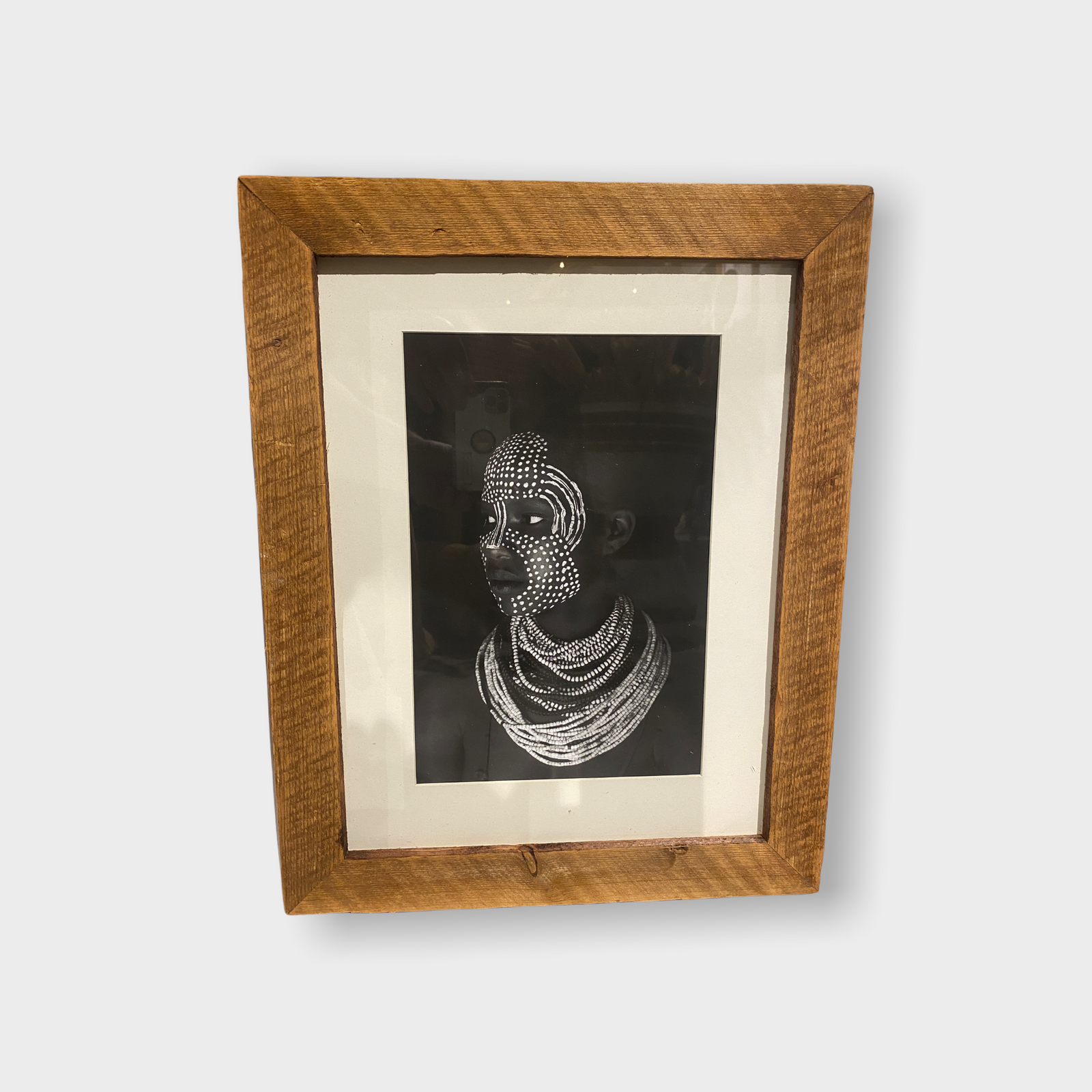 Photos of the vanishing tribes of the Omo Valley in Ethiopia, framed in wood