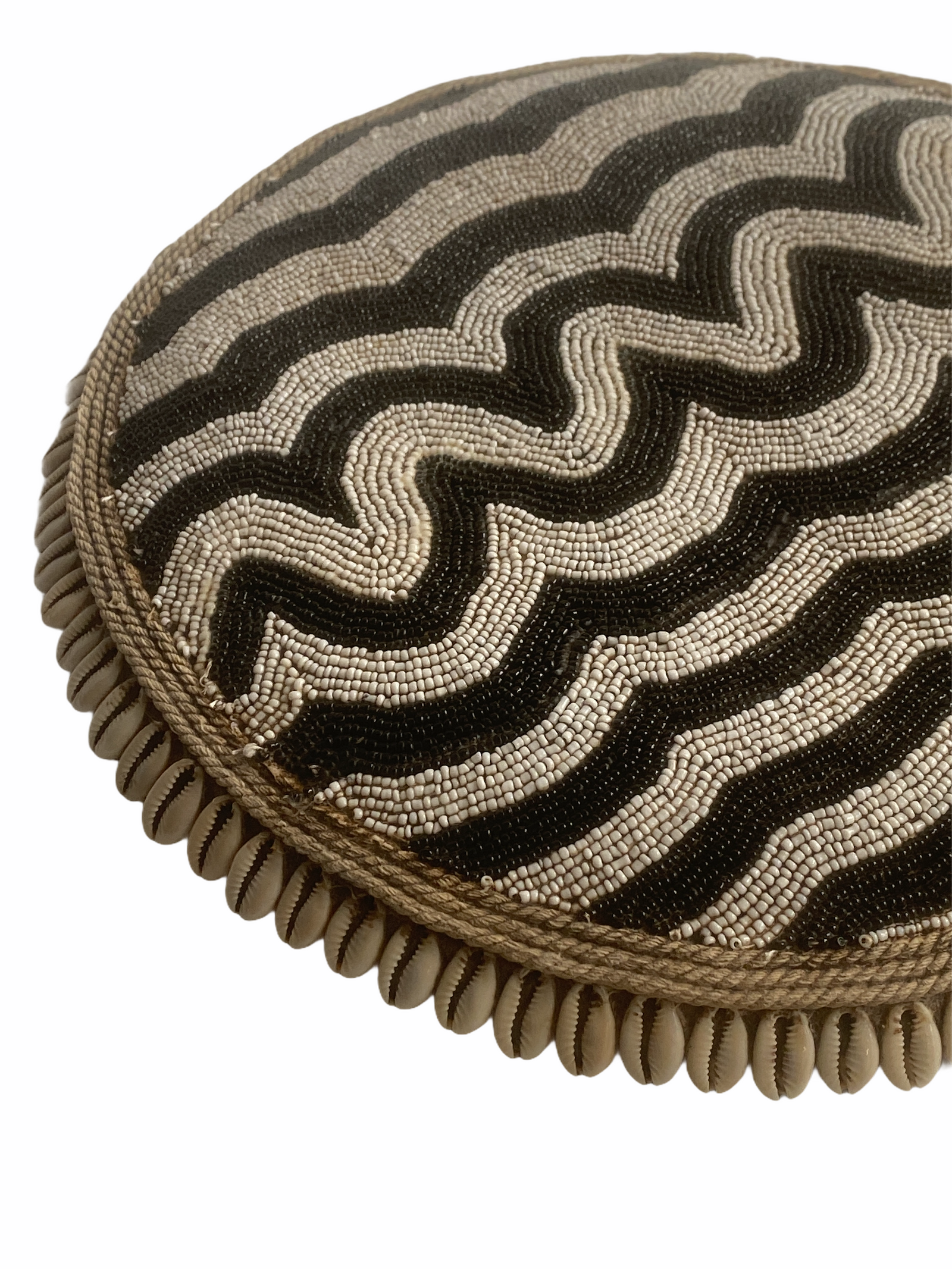 Cameroon beaded shield with black and white beads and cowrie shells