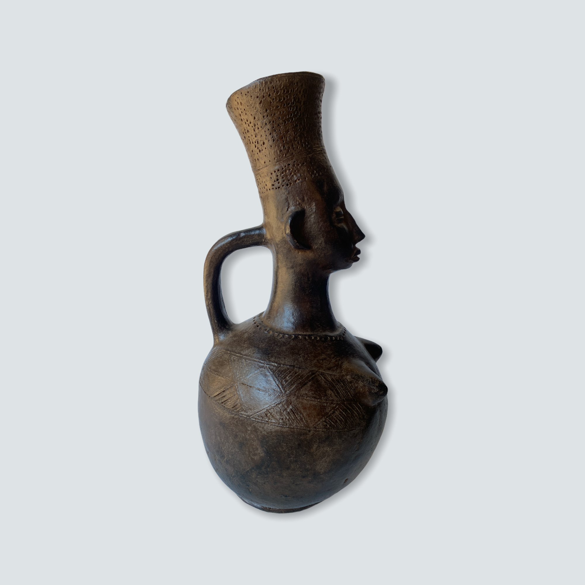 Mangbetu figural clay pot
