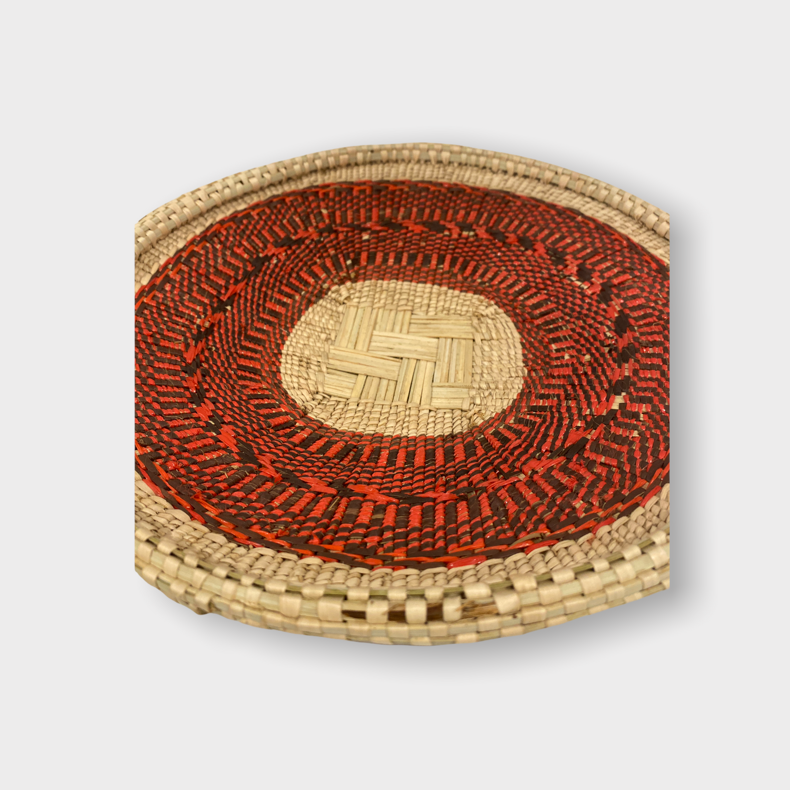 Handwoven Tonga basket in red recycled fibre, Zimbabwe