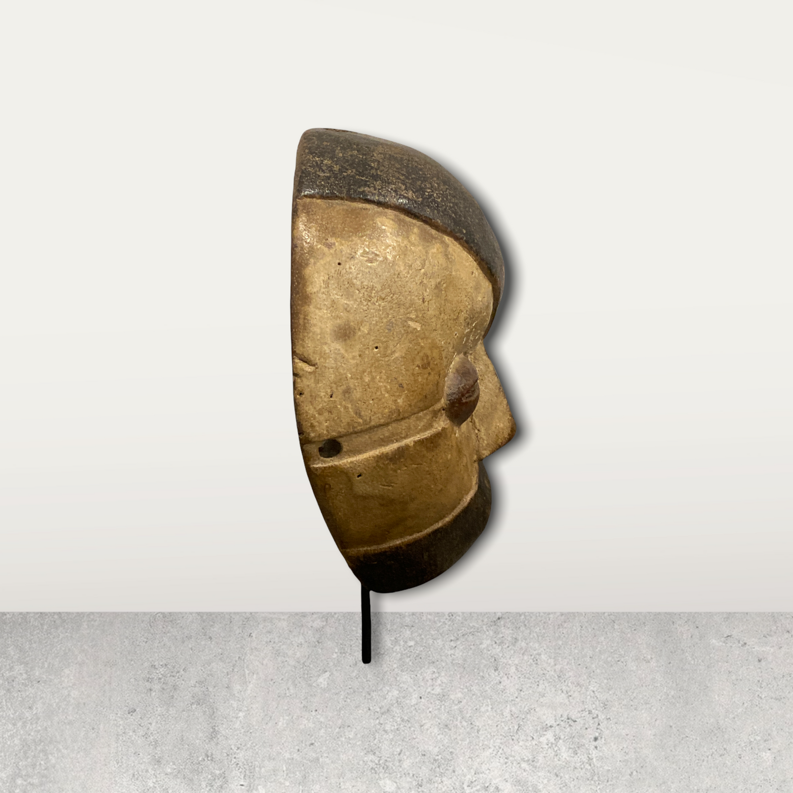 Small African mask on stand