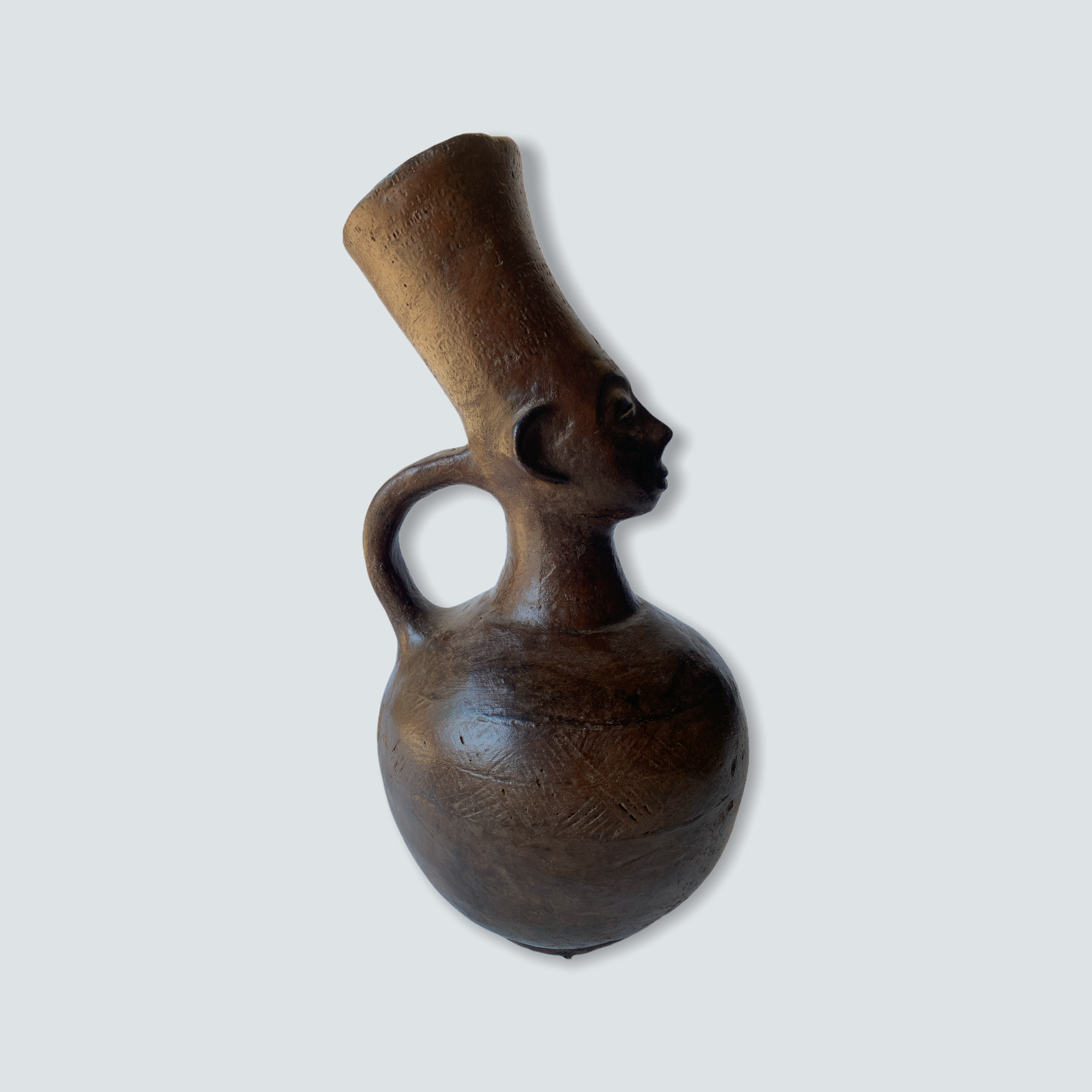 Mangbetu figural clay pot