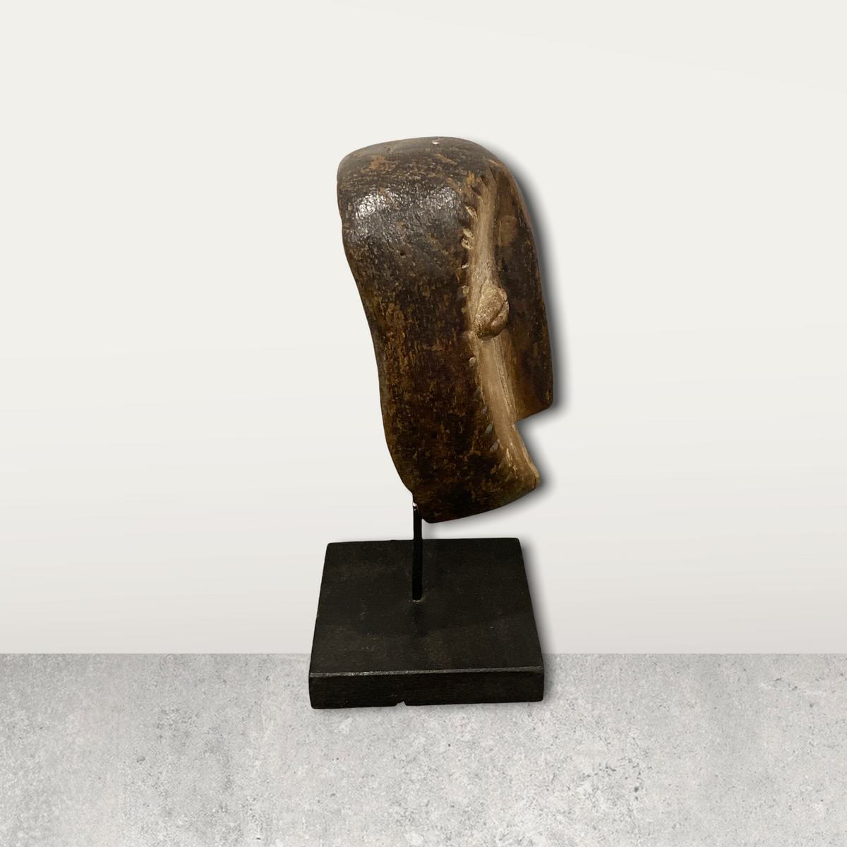 Small African mask on stand