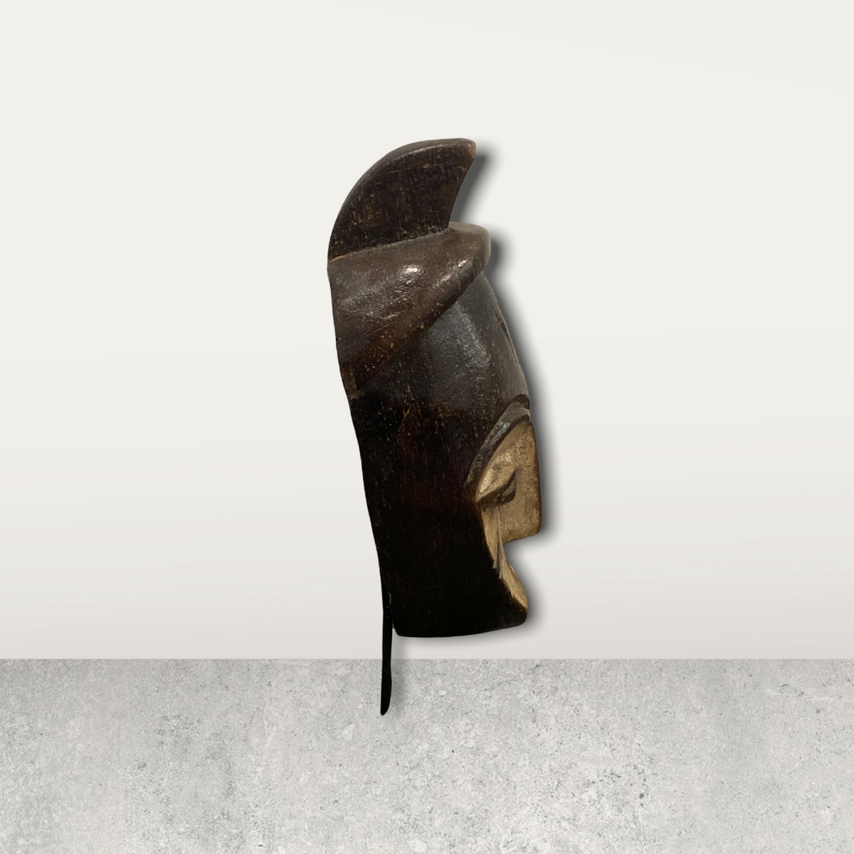 Small African mask on stands