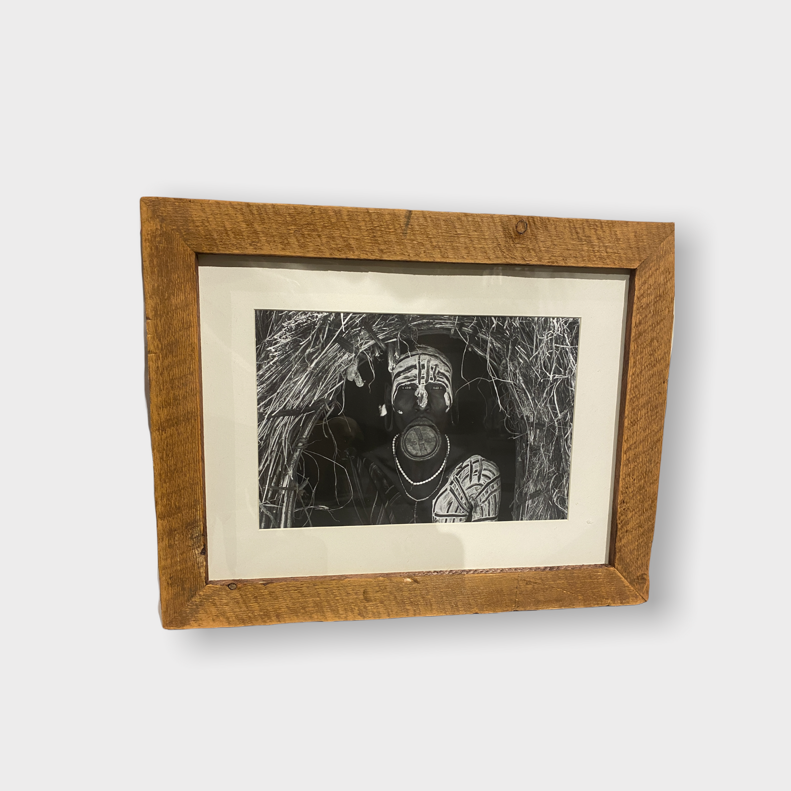 Photos of the vanishing tribes of the Omo Valley in Ethiopia, framed in wood